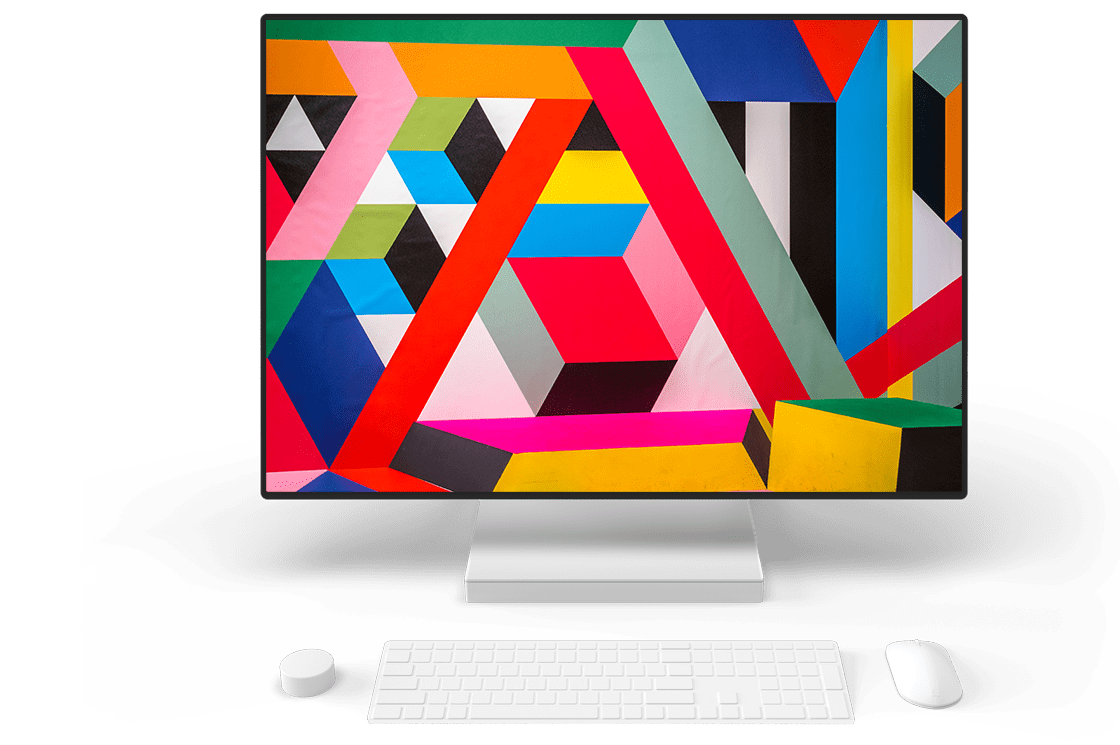 un ordinateur de bureau dont l'écran affiche une image coloré